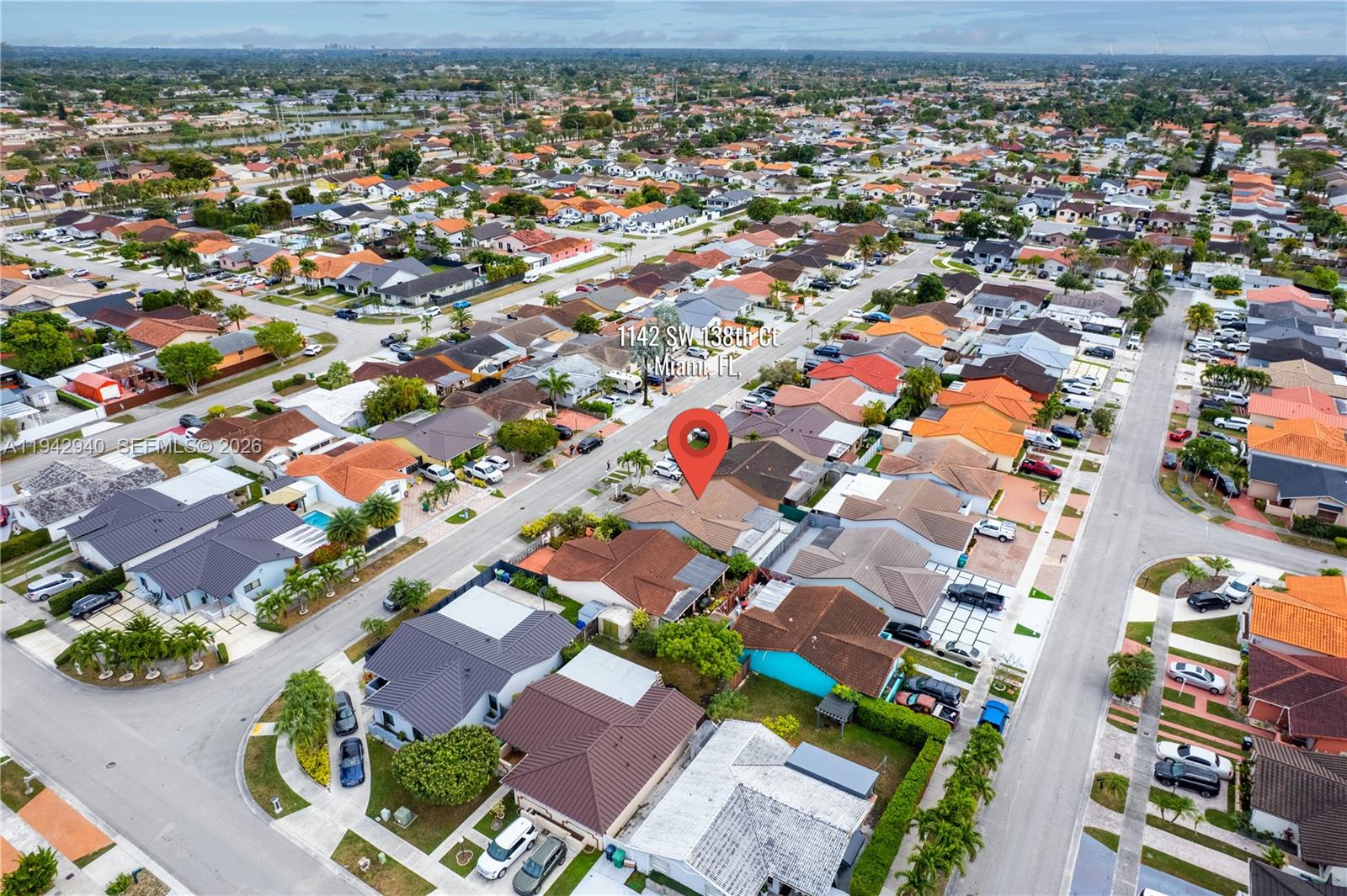 1142 Southwest 138th Court Miami, FL 33184 - Photo 49 of 50 an aerial view of residential houses with outdoor space