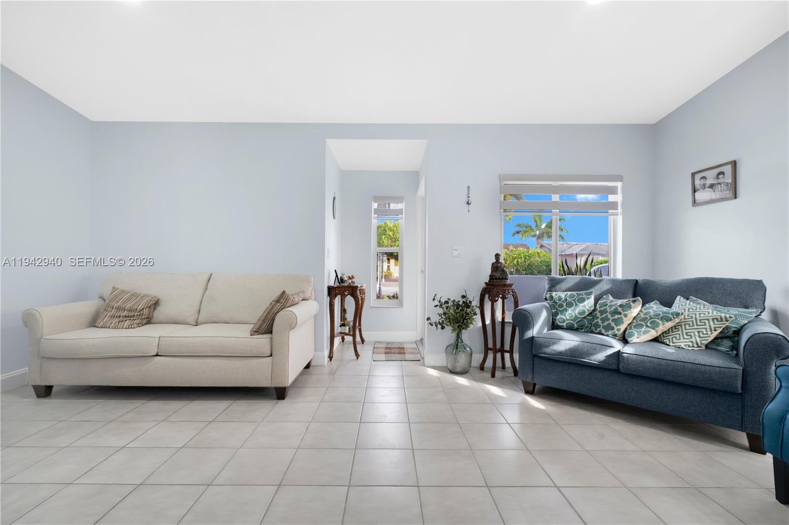 1142 Southwest 138th Court Miami, FL 33184 - Photo 7 of 50 a living room with furniture and a couch