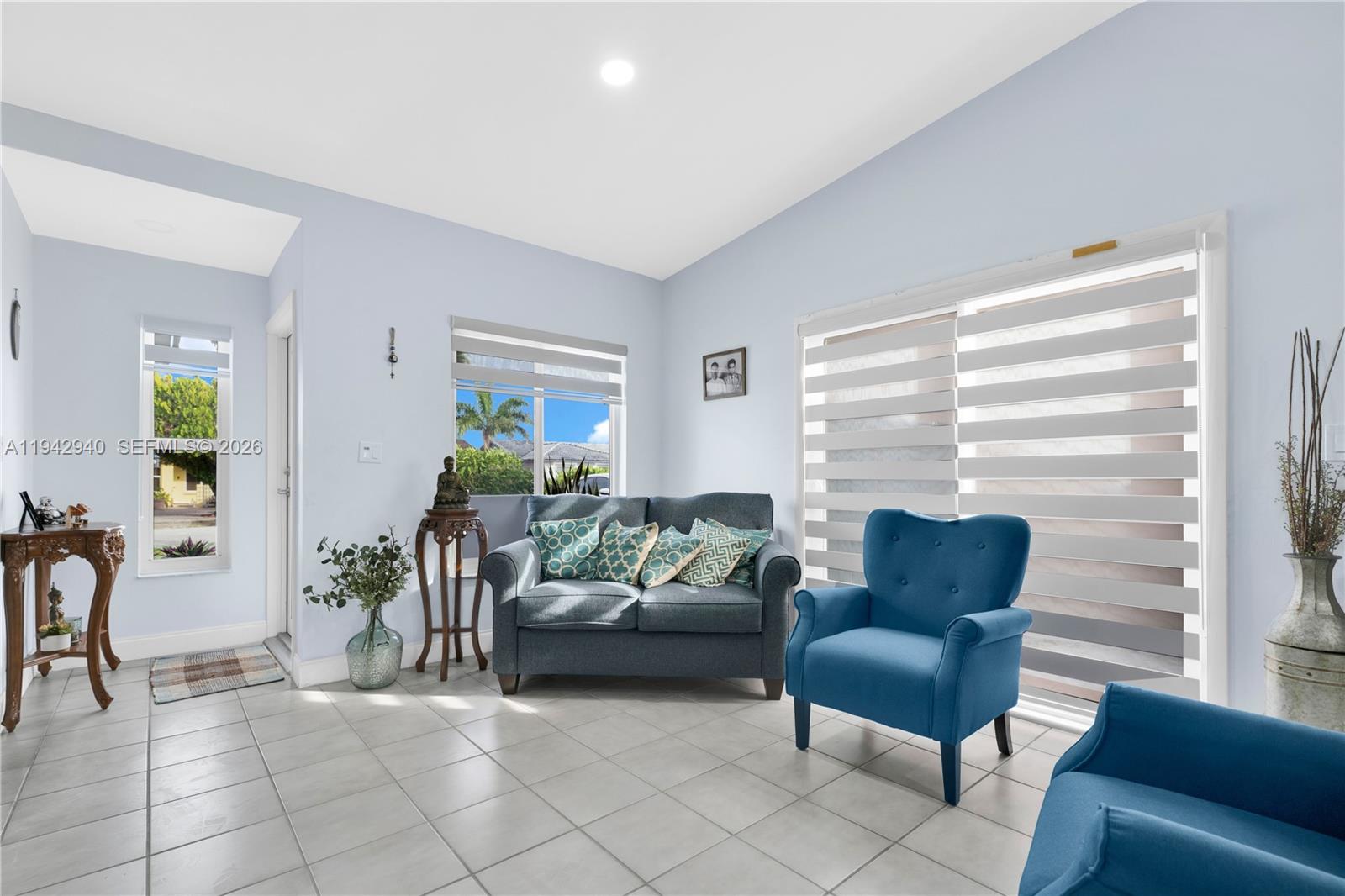 1142 Southwest 138th Court Miami, FL 33184 - Photo 8 of 50 a living room with furniture and a potted plant