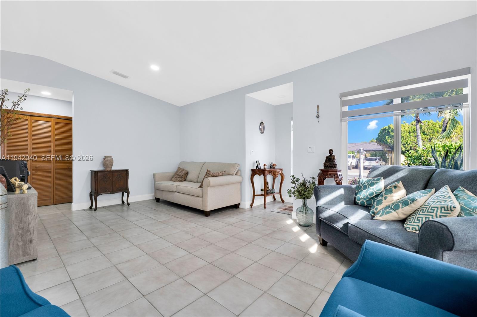 1142 Southwest 138th Court Miami, FL 33184 - Photo 9 of 50 a living room with furniture and a couch