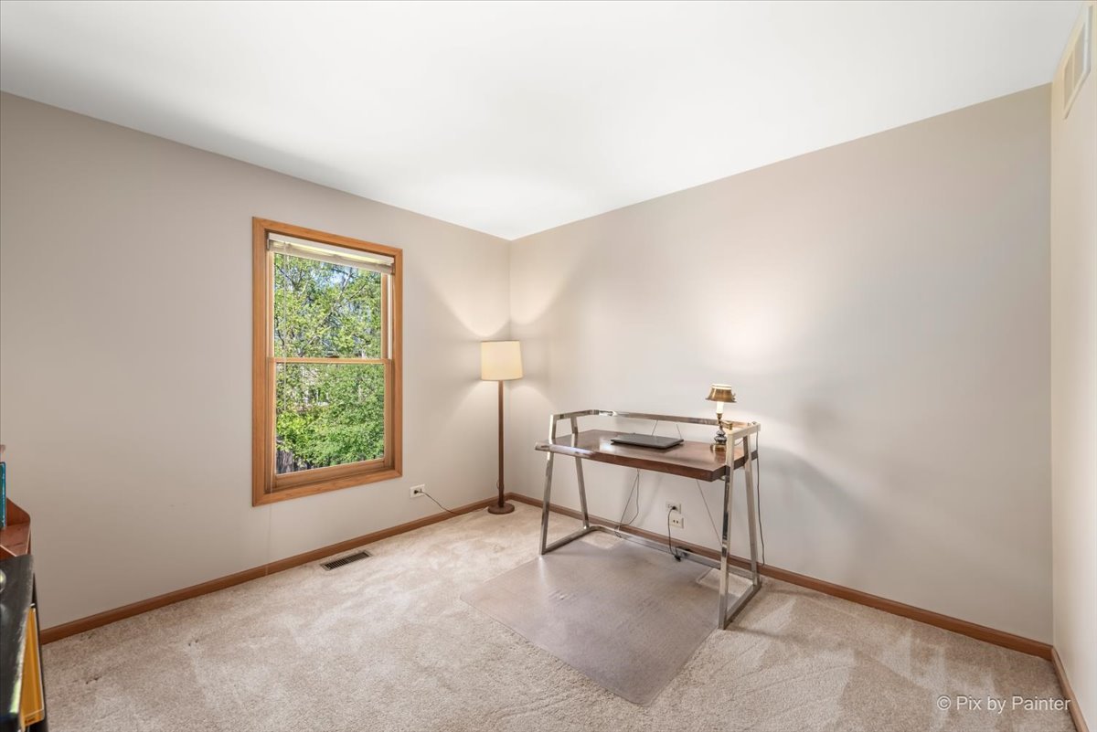 121 Hampton Street Cary, IL 60013 - Photo 33 of 56 a room with a desk and a window