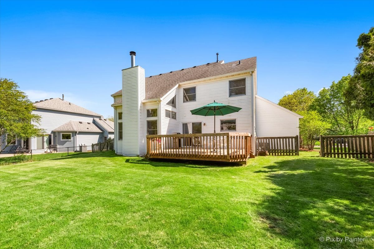 121 Hampton Street Cary, IL 60013 - Photo 43 of 56 a view of a house with a yard and a porch