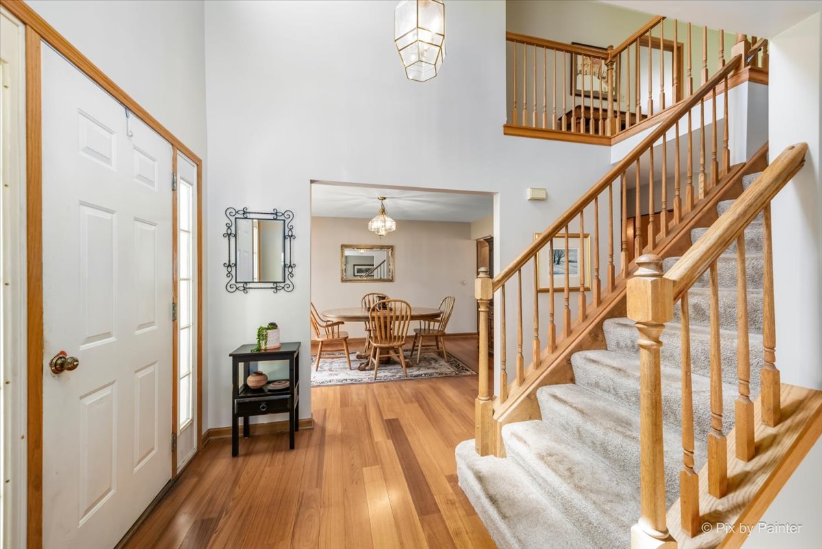 121 Hampton Street Cary, IL 60013 - Photo 6 of 56 a view of entryway and hall with wooden floor