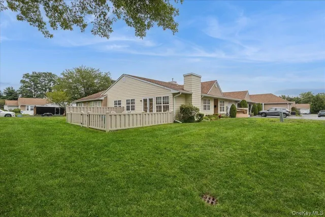 a view of a house with a big yard