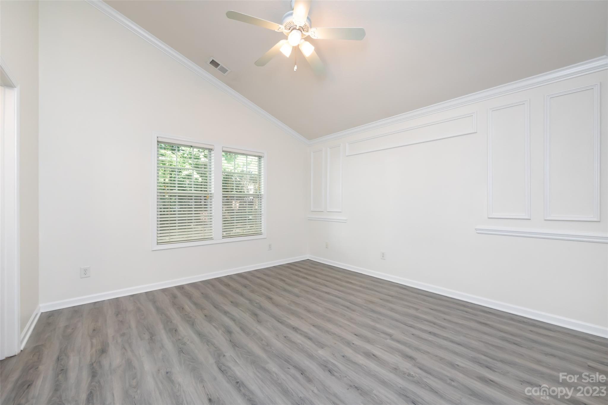 13009 Beddingfield Drive Charlotte, NC 28278 - Photo 18 of 32 wooden floor in an empty room with a window