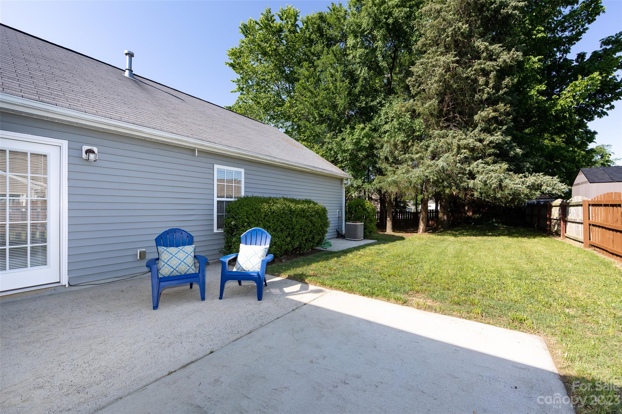 13009 Beddingfield Drive Charlotte, NC 28278 - Photo 31 of 32 a view of backyard with outdoor seating and plants