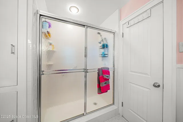 a view of a balcony with dining space