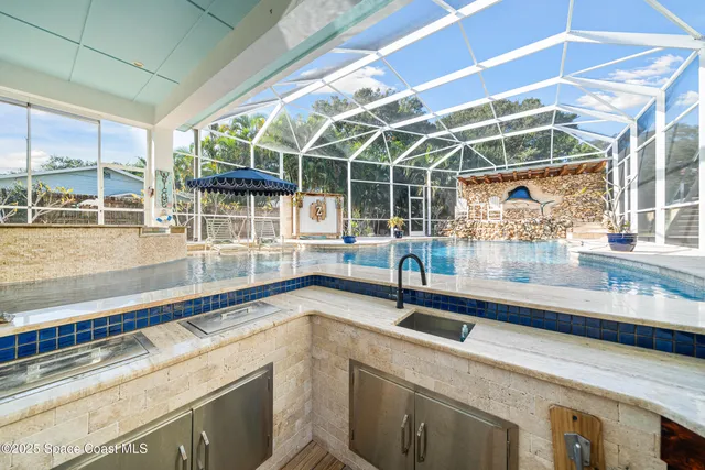 an aerial view of residential house with outdoor space