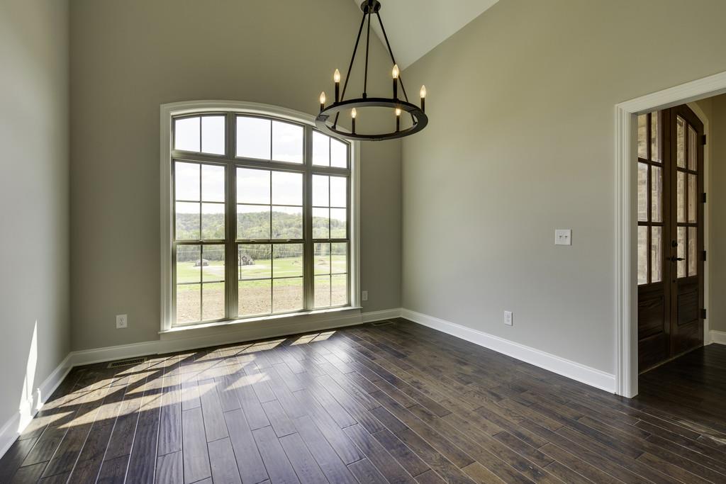 2140 Allisona Road Eagleville, TN 37060 - Photo 11 of 30 a view of an empty room with wooden floor and a window
