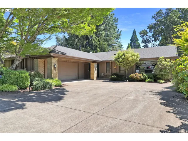 a view of a house with a garden
