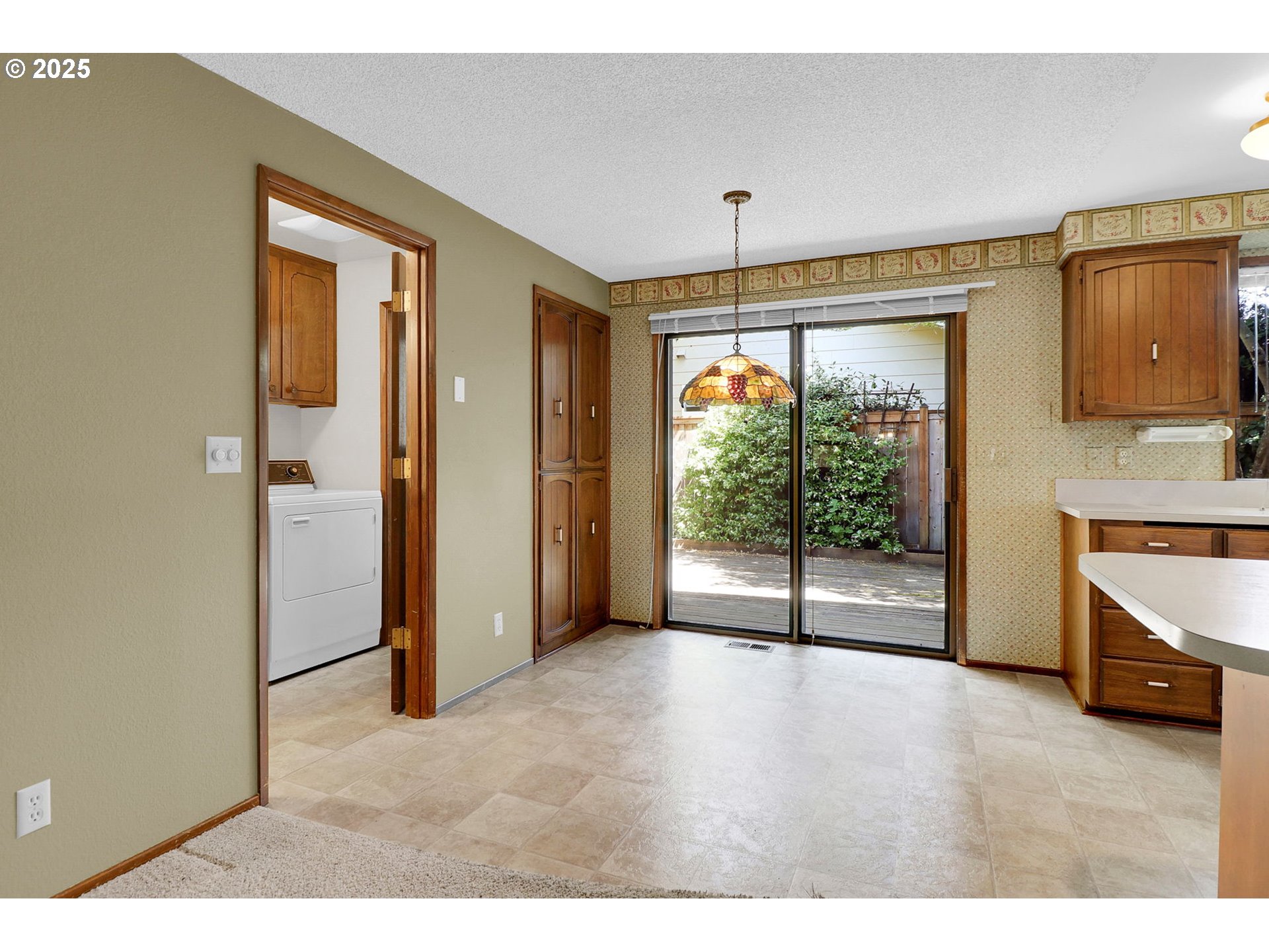 1254 Rio Glen Drive Eugene, OR 97401 - Photo 17 of 43 a view of an empty room with a window
