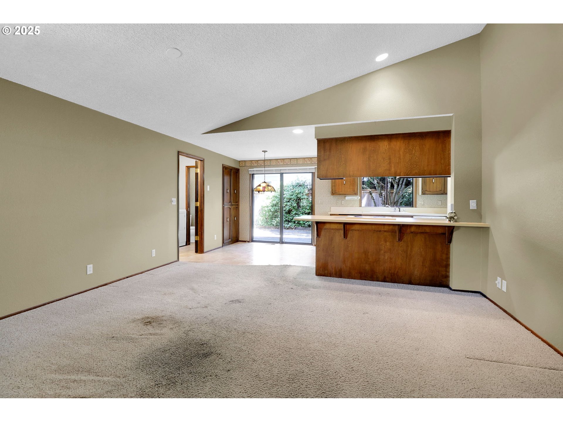 1254 Rio Glen Drive Eugene, OR 97401 - Photo 22 of 43 a view of an empty room with a window