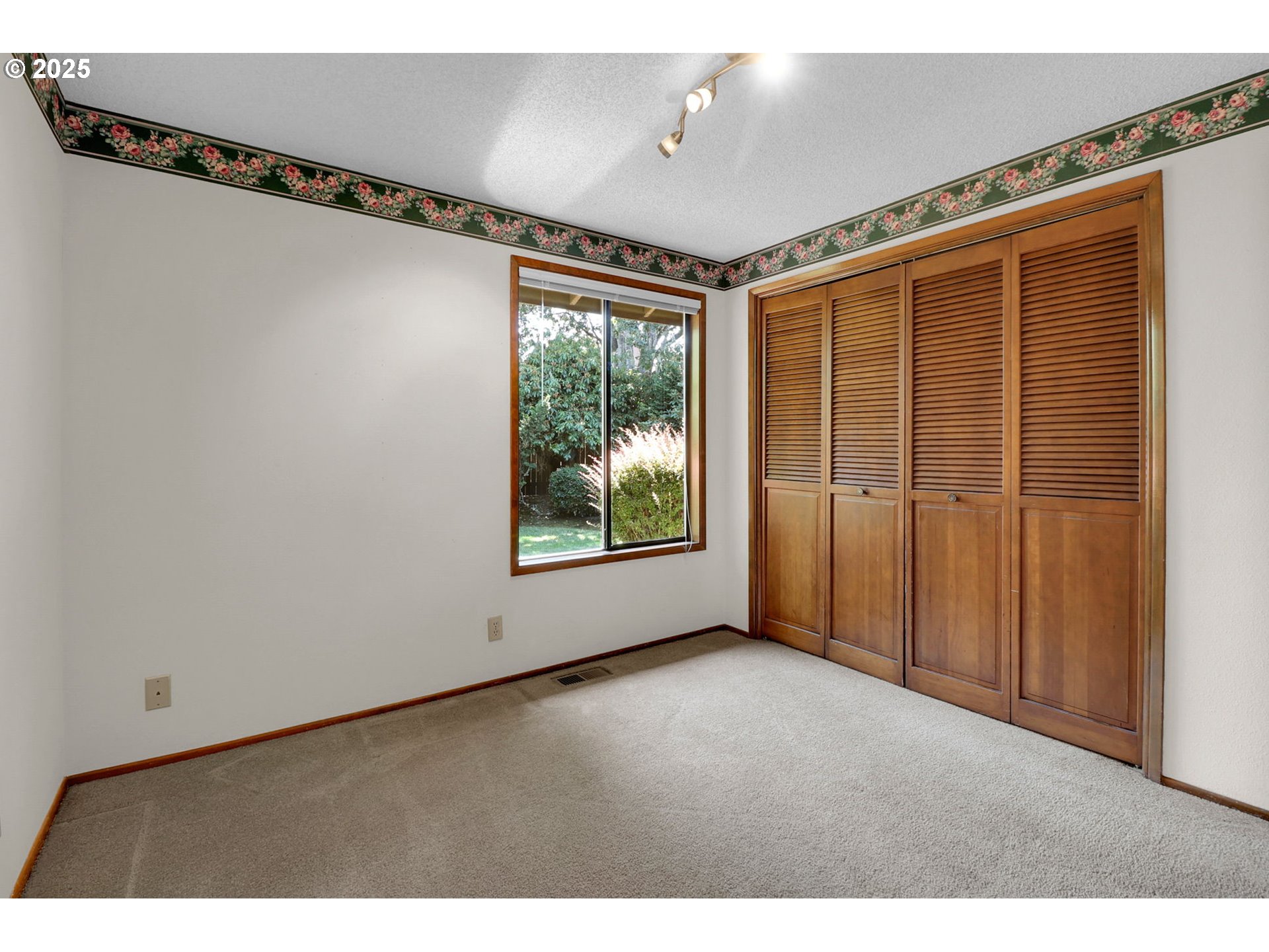 1254 Rio Glen Drive Eugene, OR 97401 - Photo 28 of 43 a view of a room with a large window