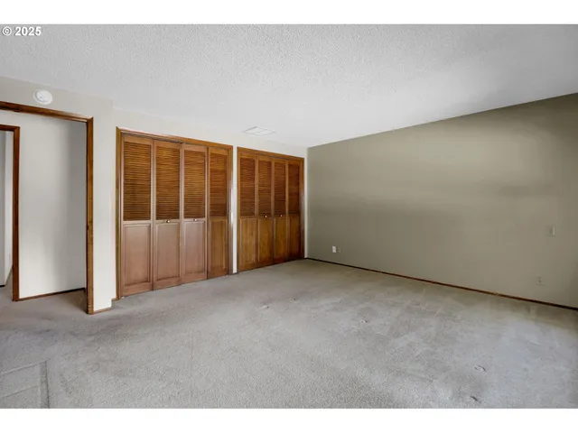 a view of outdoor space with wooden floor