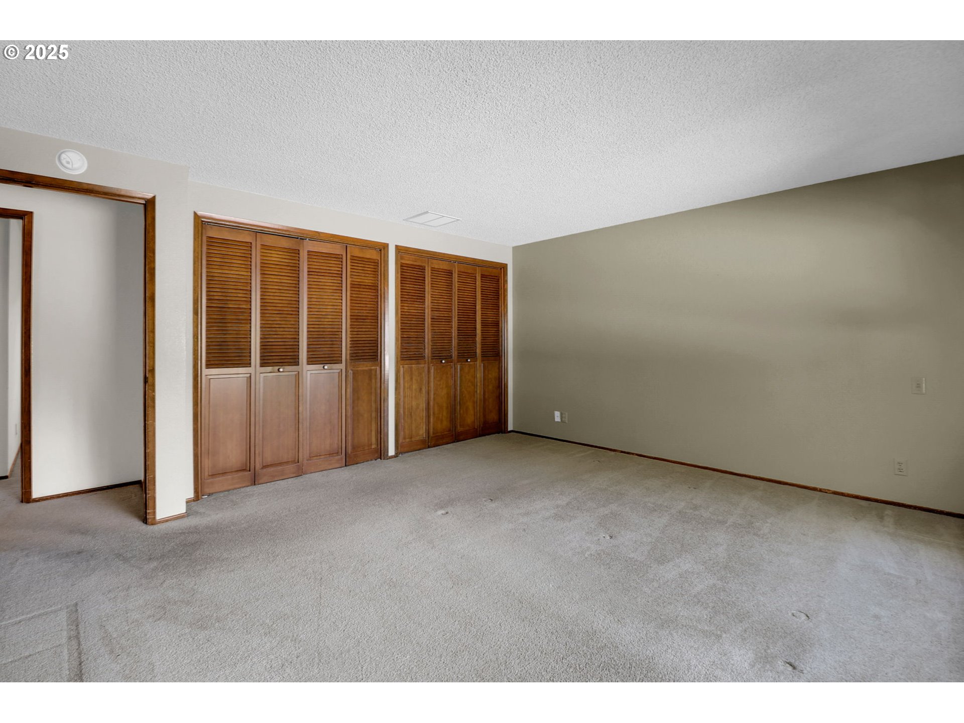 1254 Rio Glen Drive Eugene, OR 97401 - Photo 30 of 43 a view of an empty room with a window