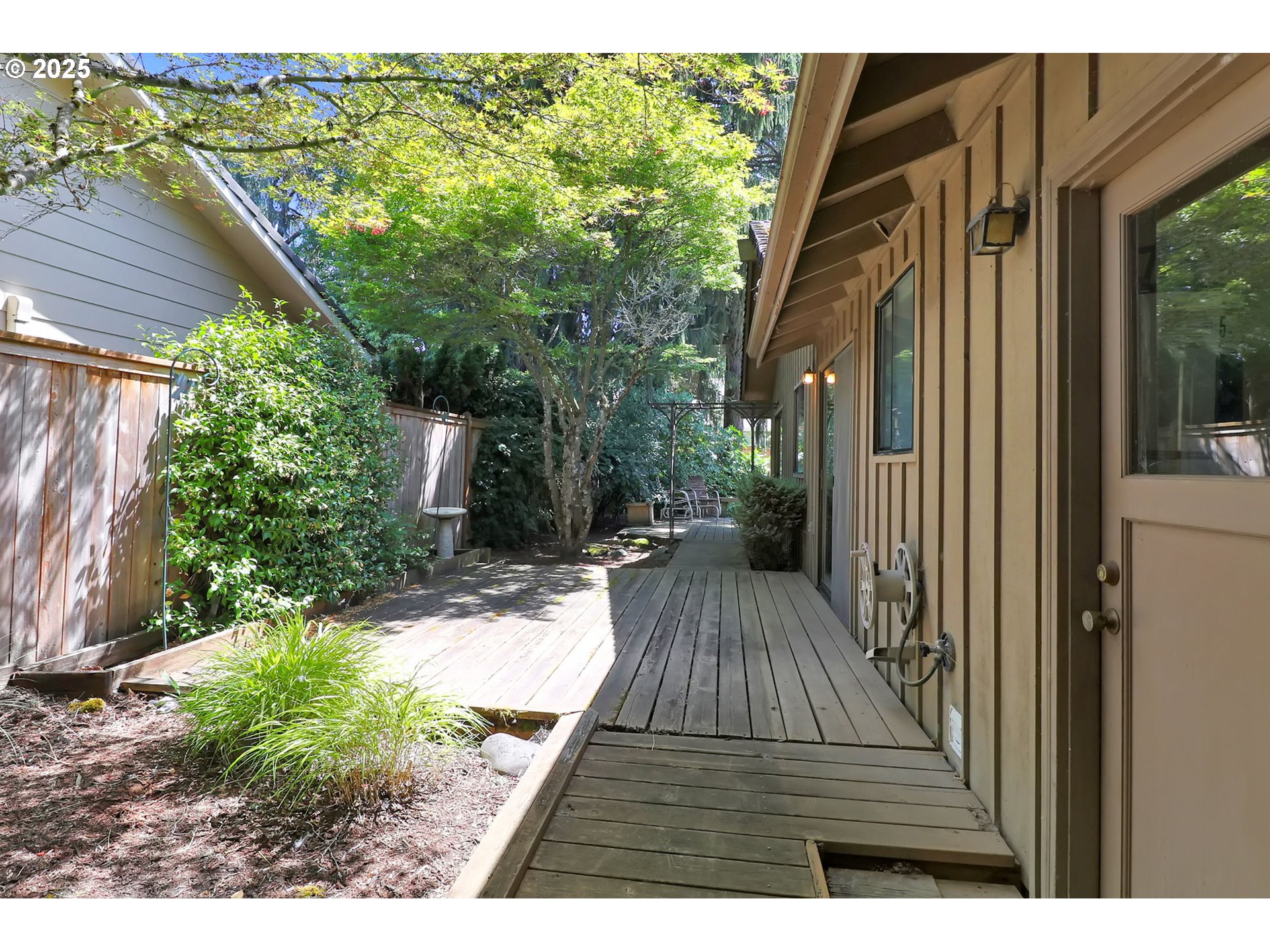 1254 Rio Glen Drive Eugene, OR 97401 - Photo 33 of 43 a view of backyard with deck and outdoor seating