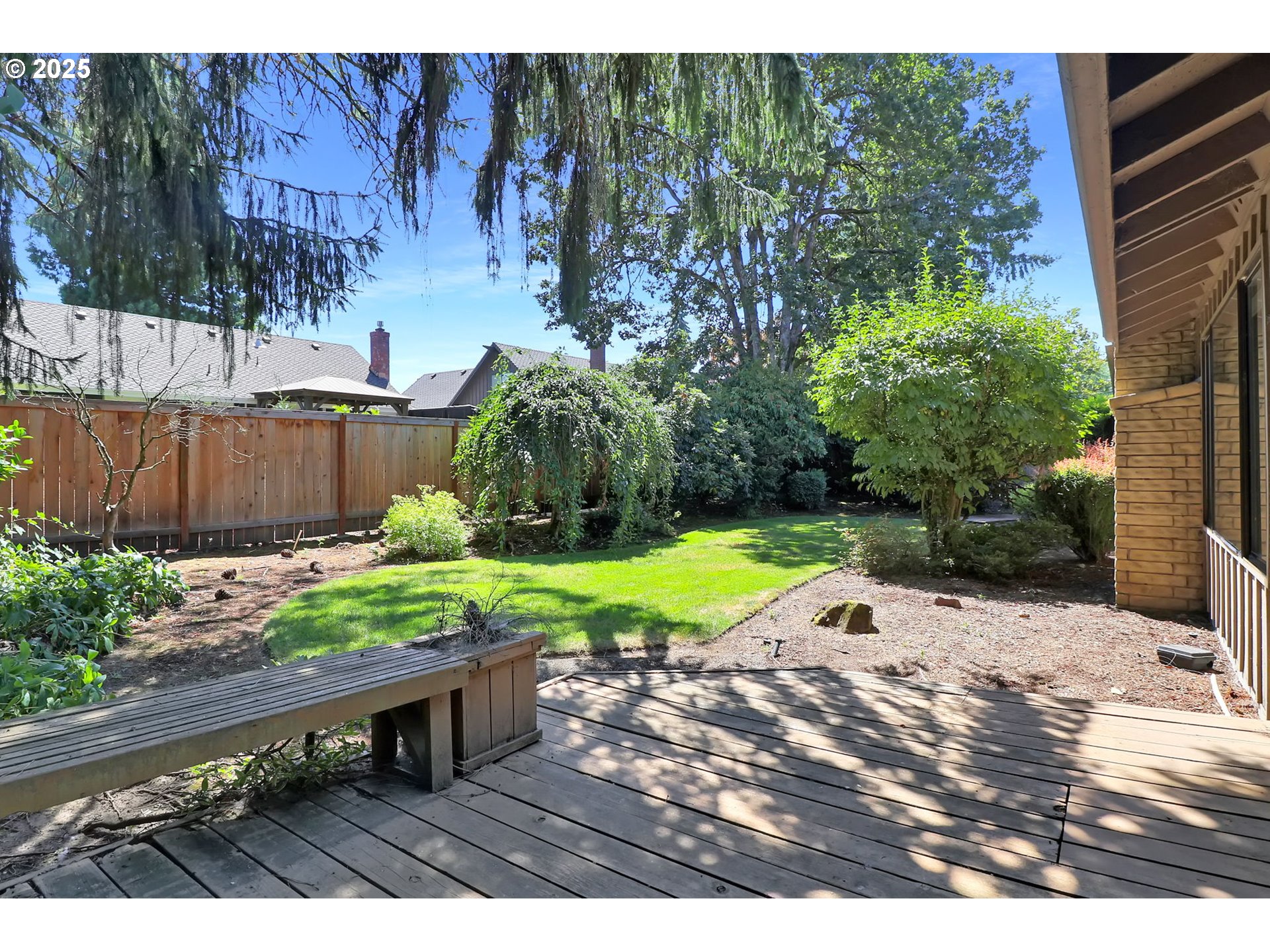 1254 Rio Glen Drive Eugene, OR 97401 - Photo 34 of 43 a view of a backyard with sitting area