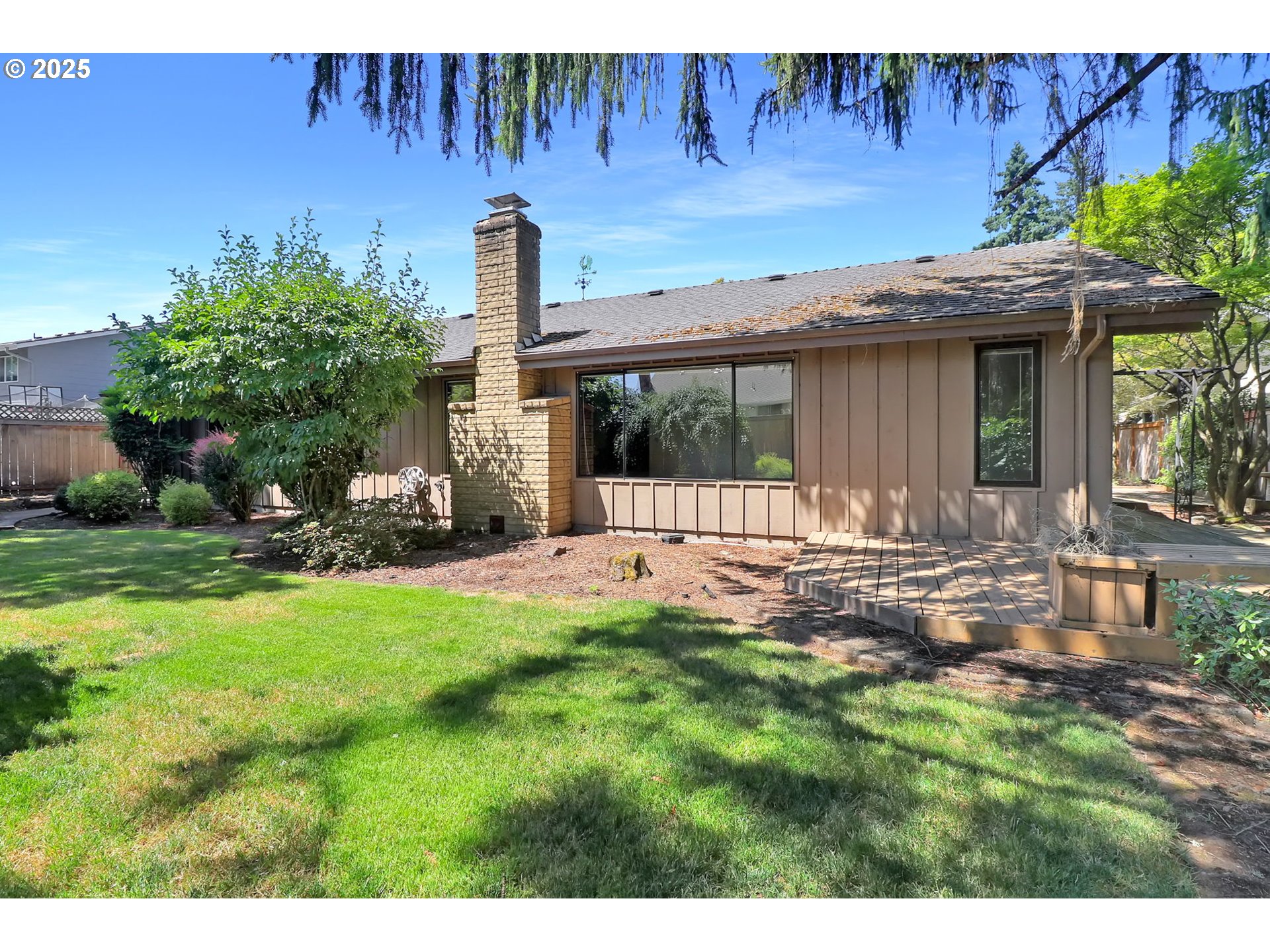 1254 Rio Glen Drive Eugene, OR 97401 - Photo 35 of 43 a view of a house with backyard and sitting area