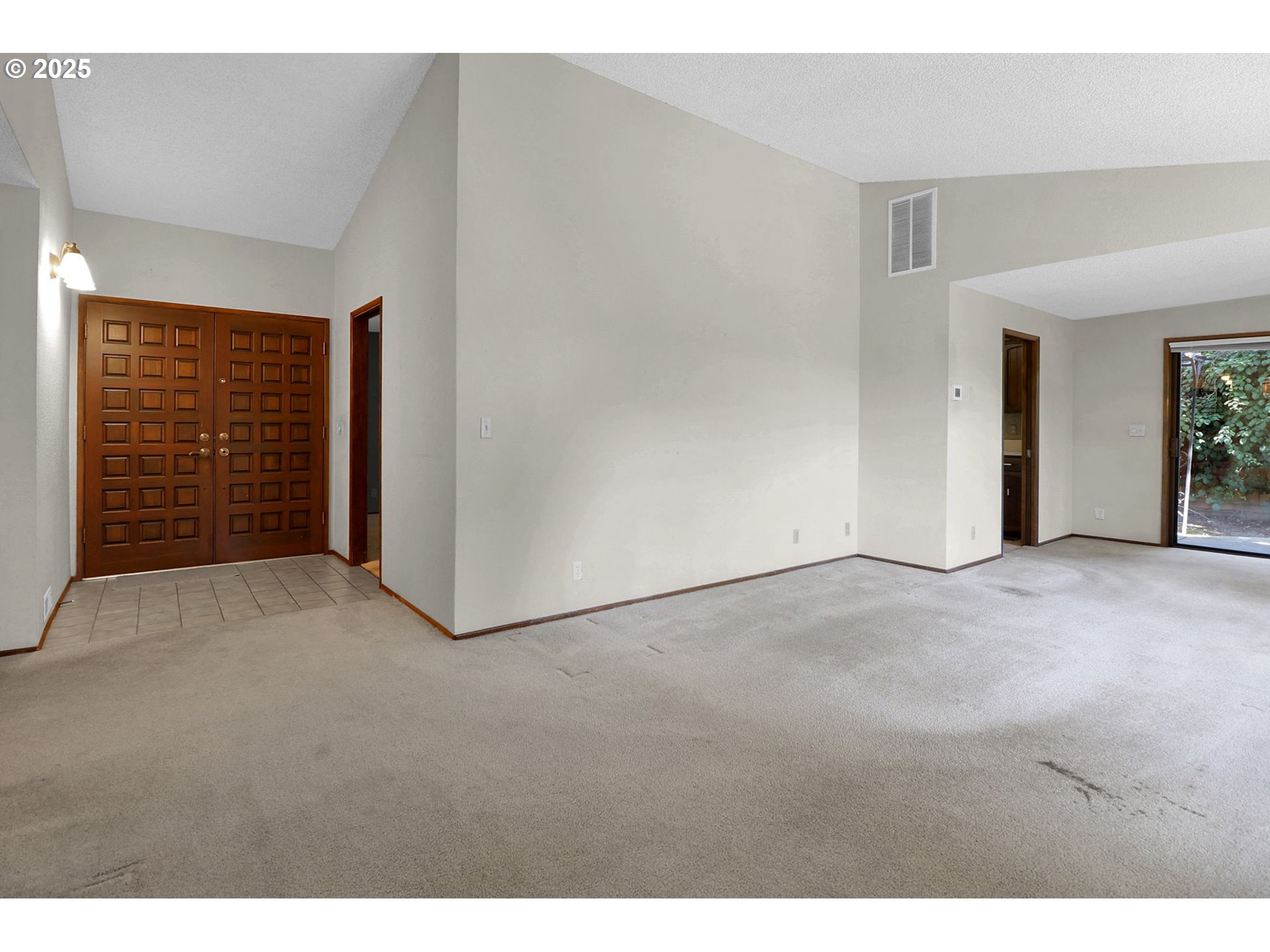1254 Rio Glen Drive Eugene, OR 97401 - Photo 8 of 43 a view of an empty room with a fireplace