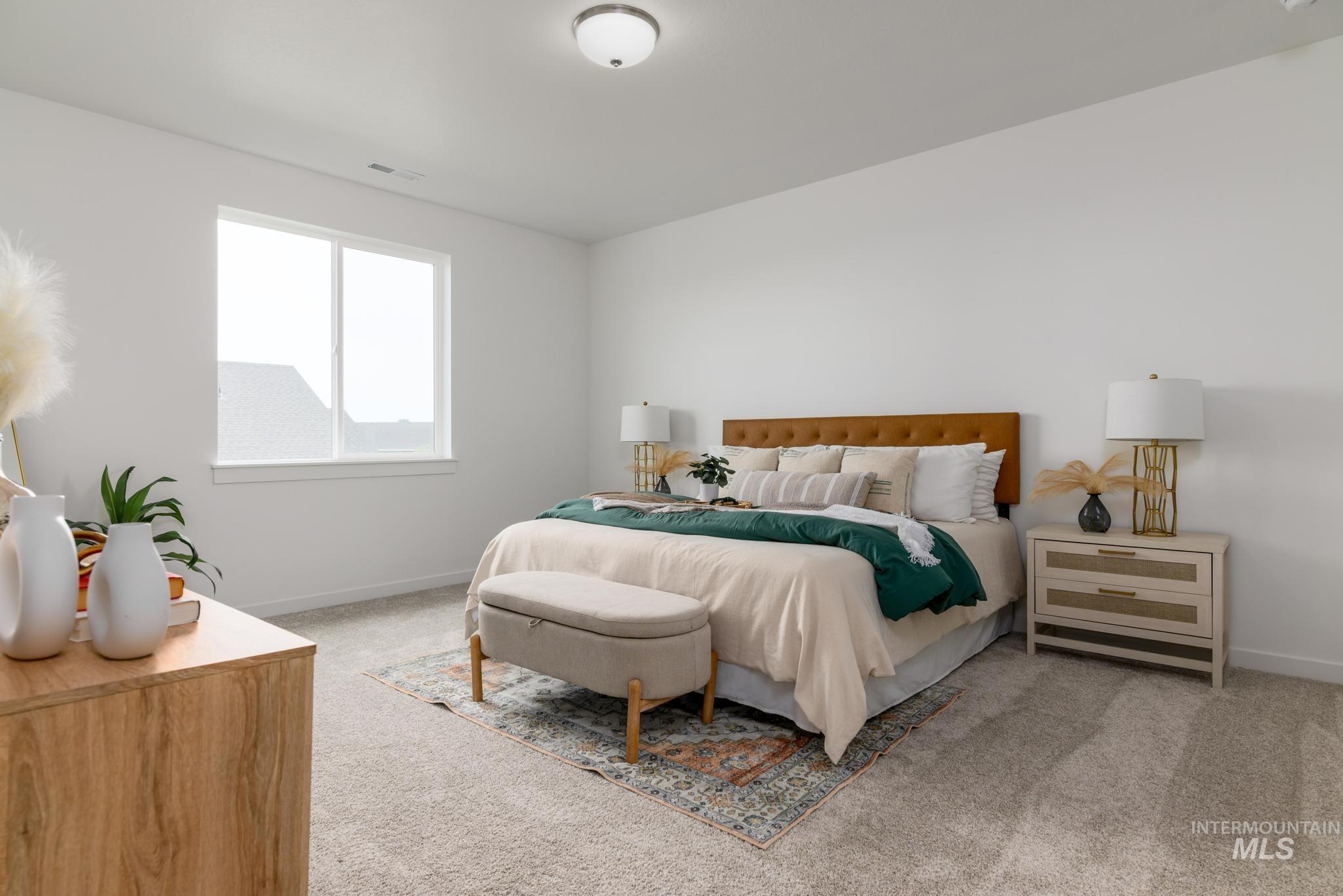 1727 West Arya Street Kuna, ID 83634 - Photo 6 of 18 Carpeted bedroom featuring baseboards