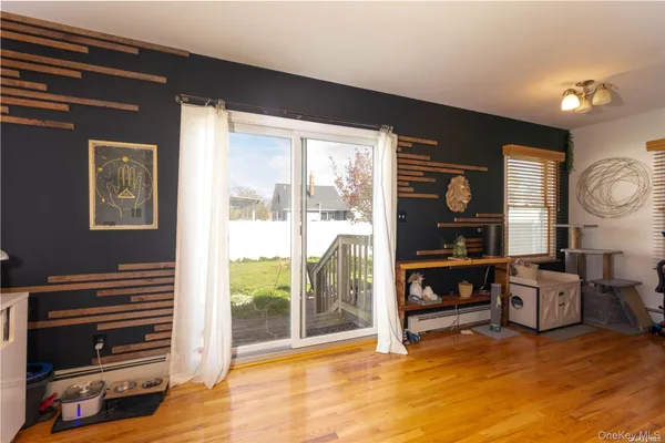 a view of livingroom with furniture and windows