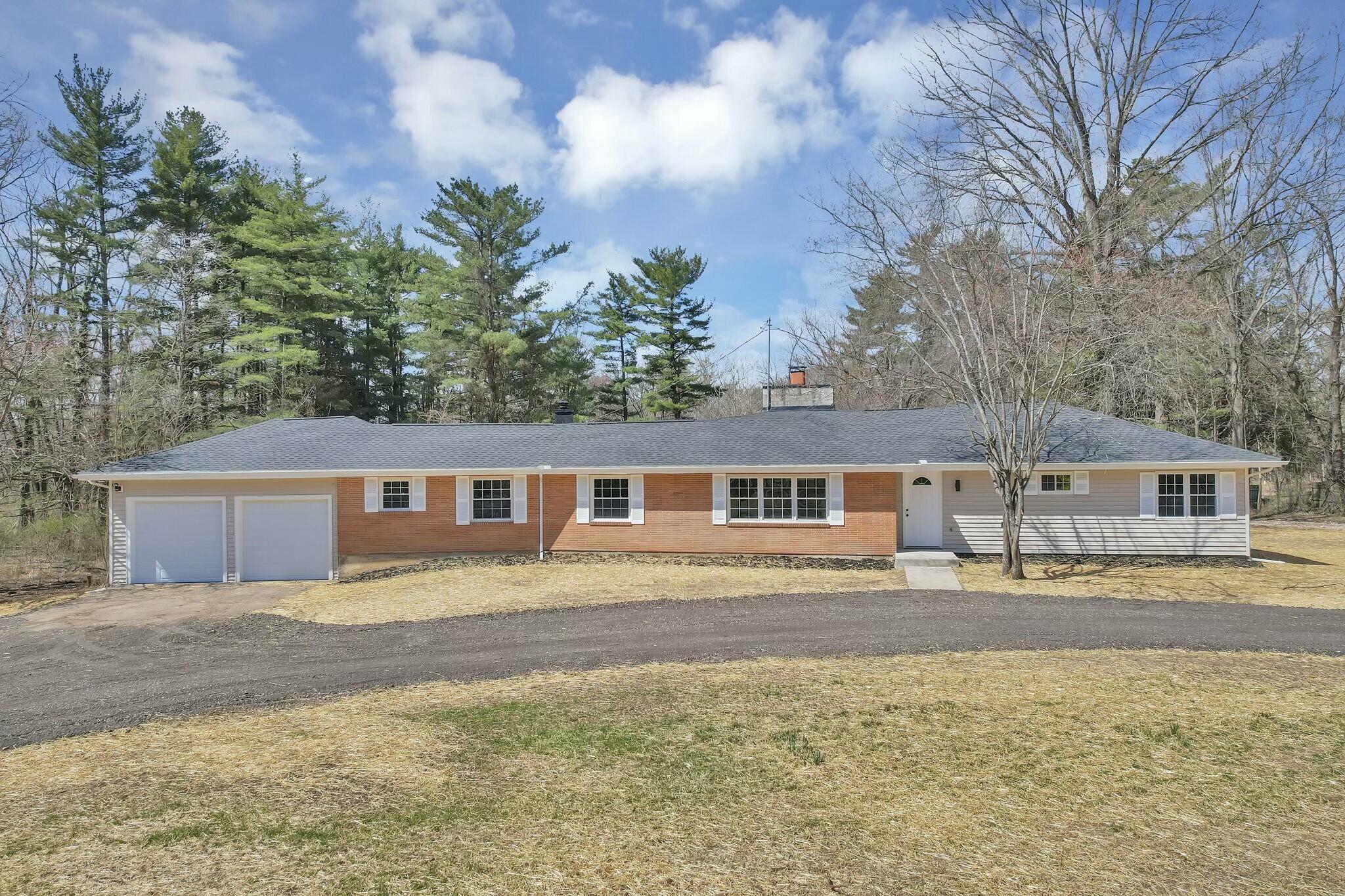 Welcome home to this stunning ranch on 4 acres!