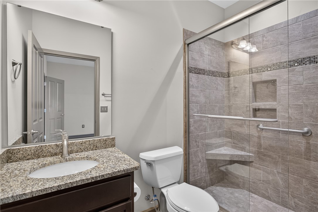 235 Pendleton Road, Unit K1 Clemson, SC 29631 - Photo 24 of 49 Granite counters and tiled shower enclosure combine for a sophisticated bathroom experience.