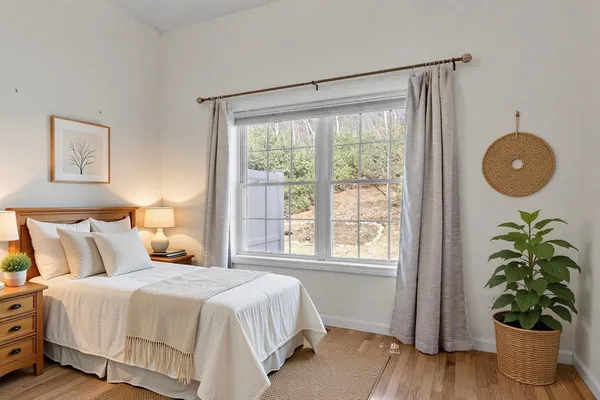 a view of a kitchen with a sink and a refrigerator
