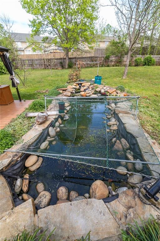 4273 Harbor Ridge Drive Greensboro, NC 27406 - Photo 42 of 42 Koi Pond (net is protection from birds)