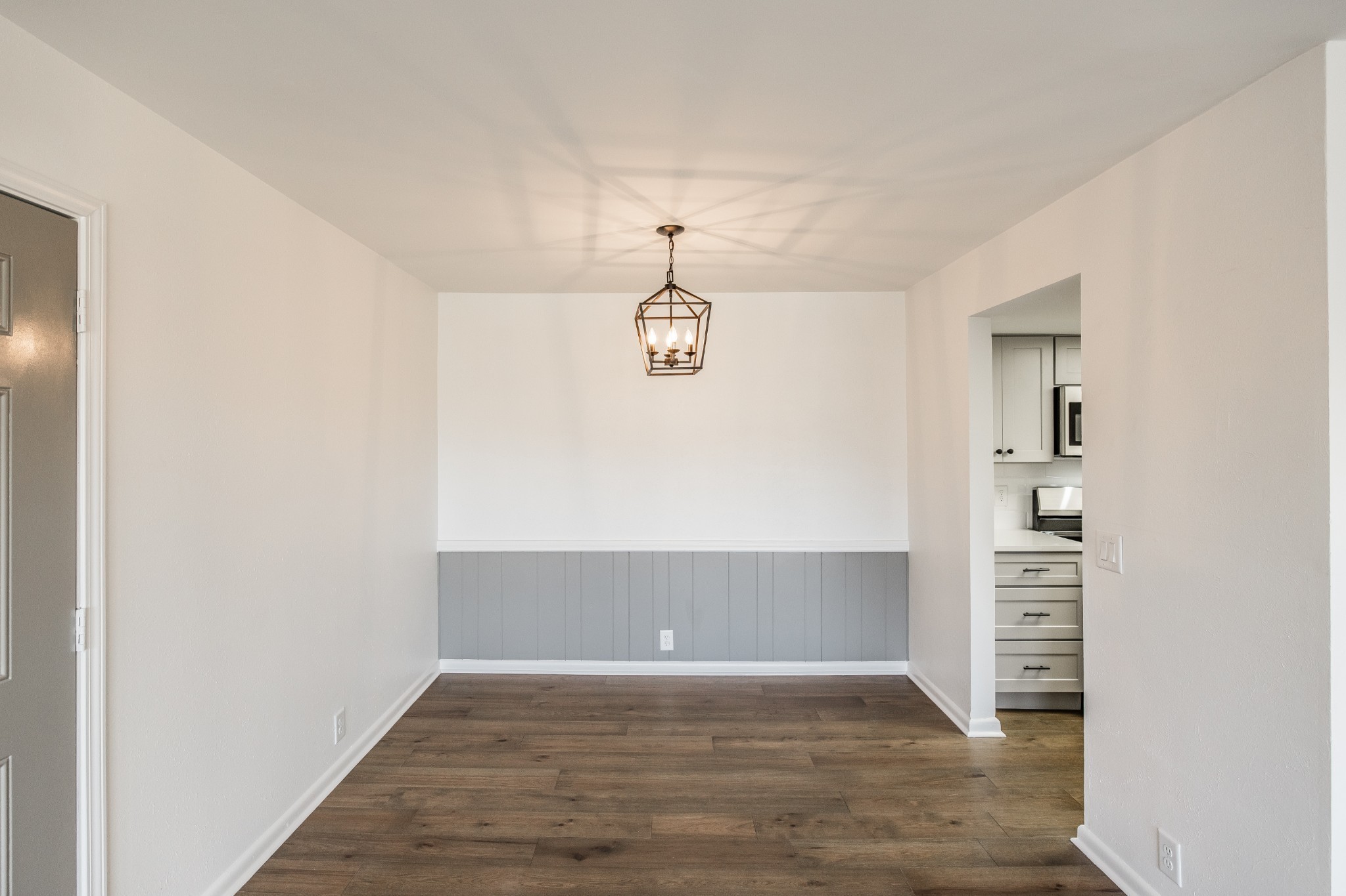 21 Vaughns Gap Road, Unit 55 Nashville, TN 37205 - Photo 9 of 35 wooden floor in an empty room with a window