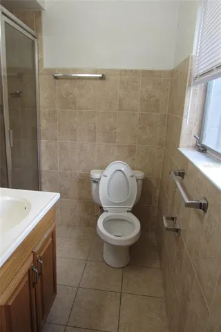 a bathroom with a toilet and a sink