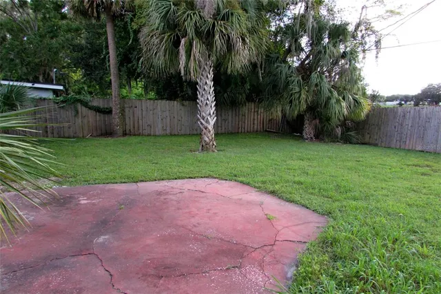 a view of backyard with green space