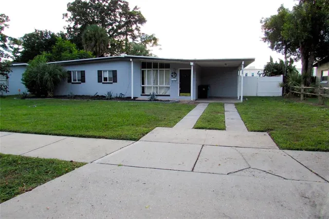 a view of outdoor space yard and front view of a house