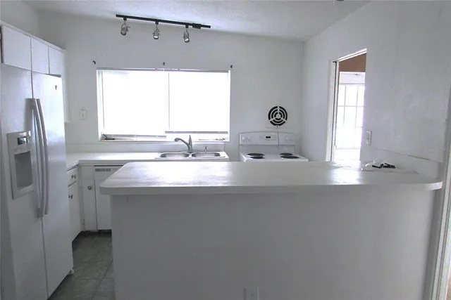 a bathroom with a sink double vanity and a mirror