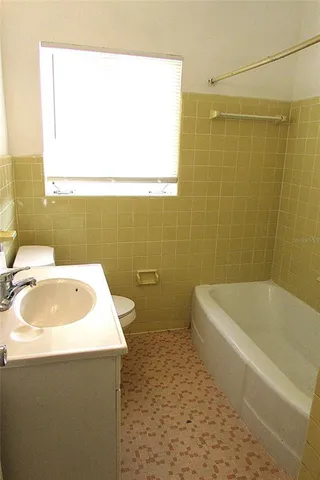 a bathroom with a sink and a bathtub