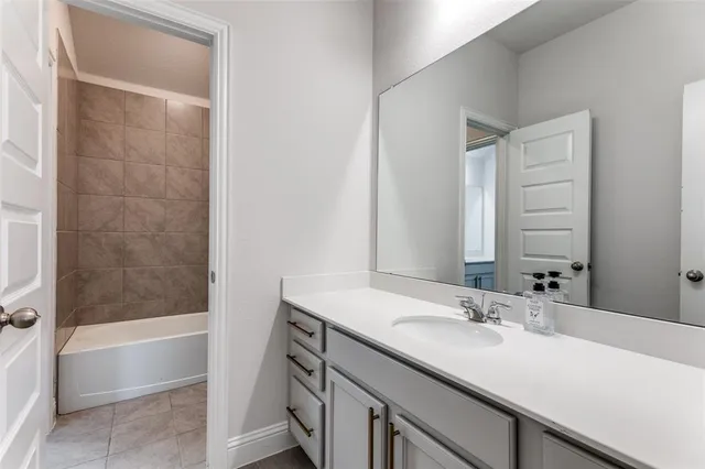 a bathroom with a sink and a bathtub