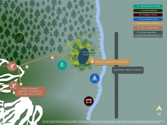 a view of a city with lush green forest