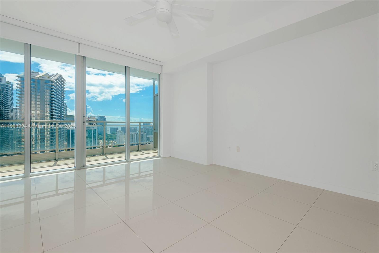 92 Southwest 3rd Street, Unit 3503 Miami, FL 33130 - Photo 19 of 35 a view of an empty room and window
