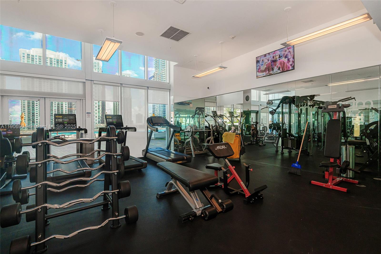 92 Southwest 3rd Street, Unit 3503 Miami, FL 33130 - Photo 29 of 35 a view of a room with gym equipment