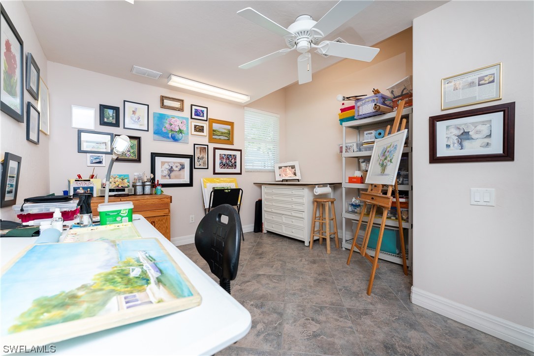3290 Sugarloaf Key Road Punta Gorda, FL 33955 - Photo 32 of 50 a view of a workspace with furniture and toys