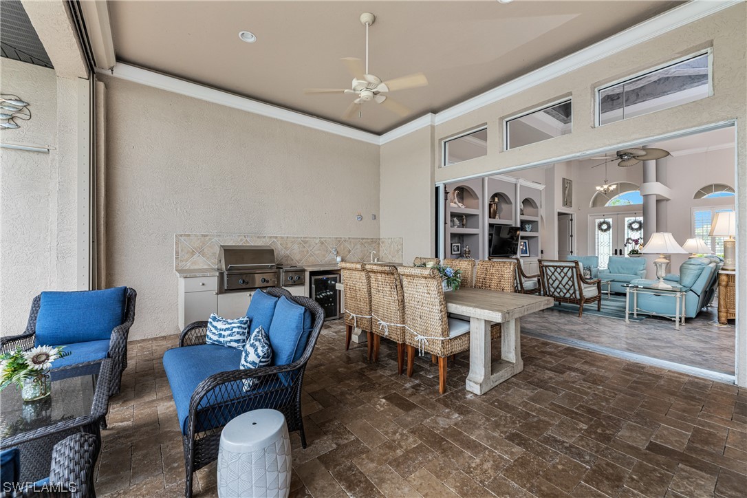 3290 Sugarloaf Key Road Punta Gorda, FL 33955 - Photo 38 of 50 a living room with furniture and a chandelier