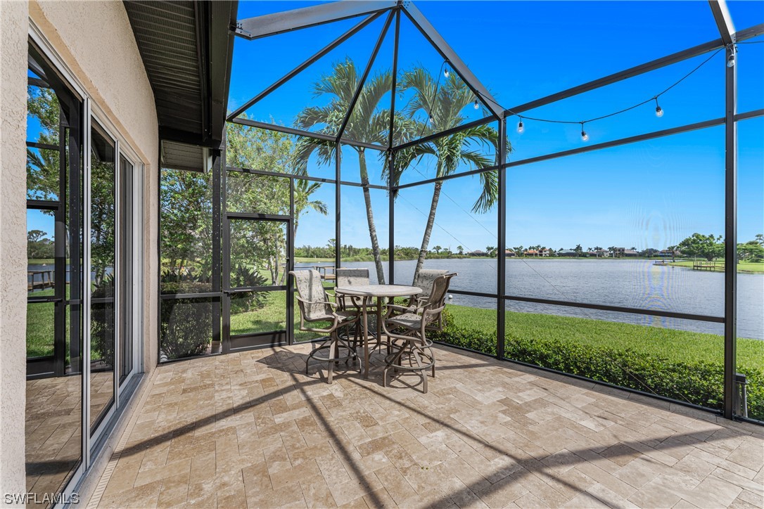 3290 Sugarloaf Key Road Punta Gorda, FL 33955 - Photo 40 of 50 a view of a patio with a table chairs and garden