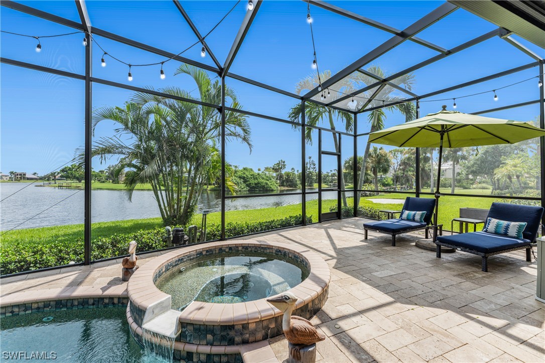 3290 Sugarloaf Key Road Punta Gorda, FL 33955 - Photo 41 of 50 a view of a chair and tables in the back yard