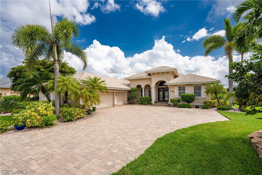 3290 Sugarloaf Key Road Punta Gorda, FL 33955 - Photo 50 of 50 a front view of a house with garden