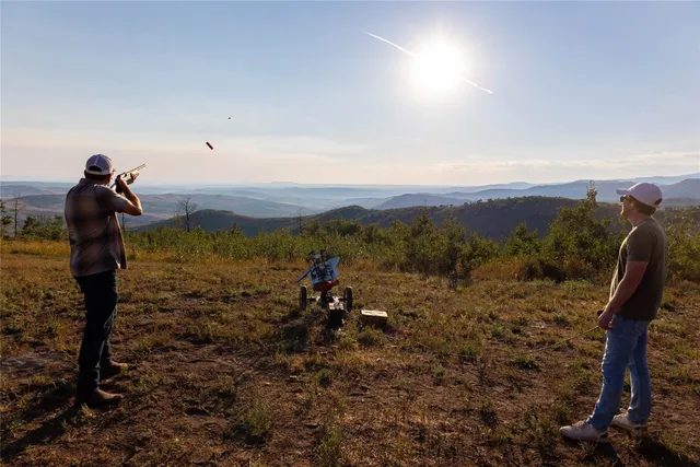 a view of a sky from a corridor