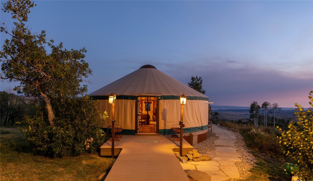 50166 County Road 80 Hayden, CO 81639 - Photo 23 of 50 a view of a house with backyard and sitting area
