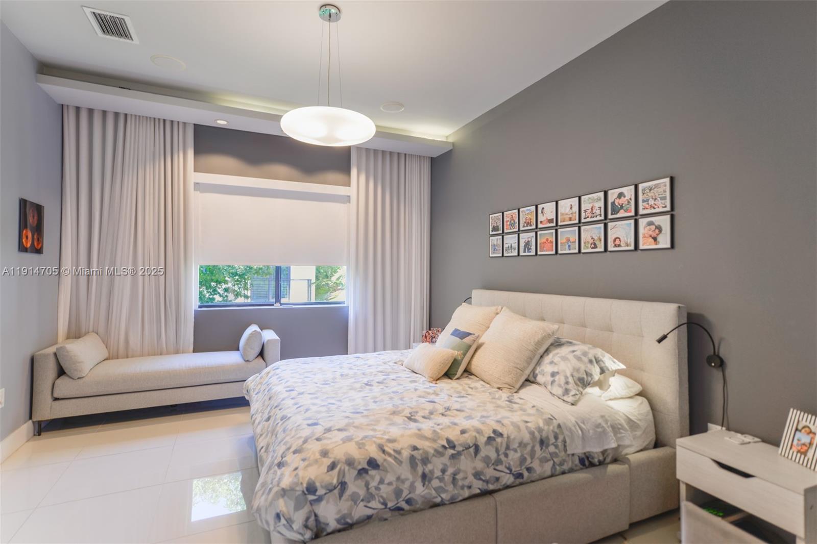 3318 Day Avenue, Unit 7 Miami, FL 33133 - Photo 18 of 39 a bedroom with a bed and a large window