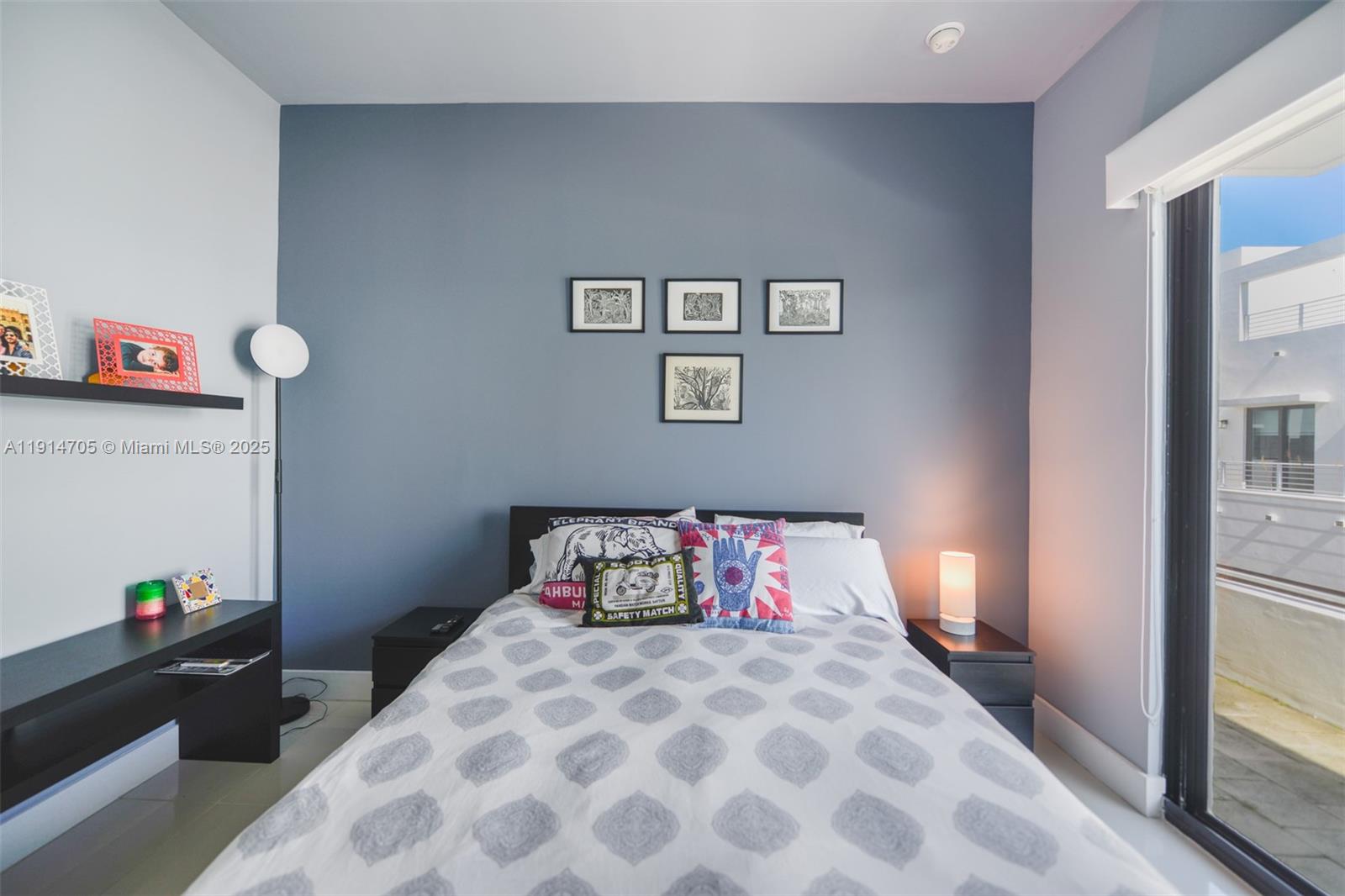 3318 Day Avenue, Unit 7 Miami, FL 33133 - Photo 33 of 39 a bedroom with a bed and wooden floor