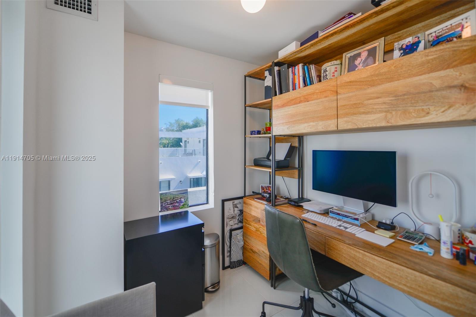 3318 Day Avenue, Unit 7 Miami, FL 33133 - Photo 36 of 39 a view of a workspace