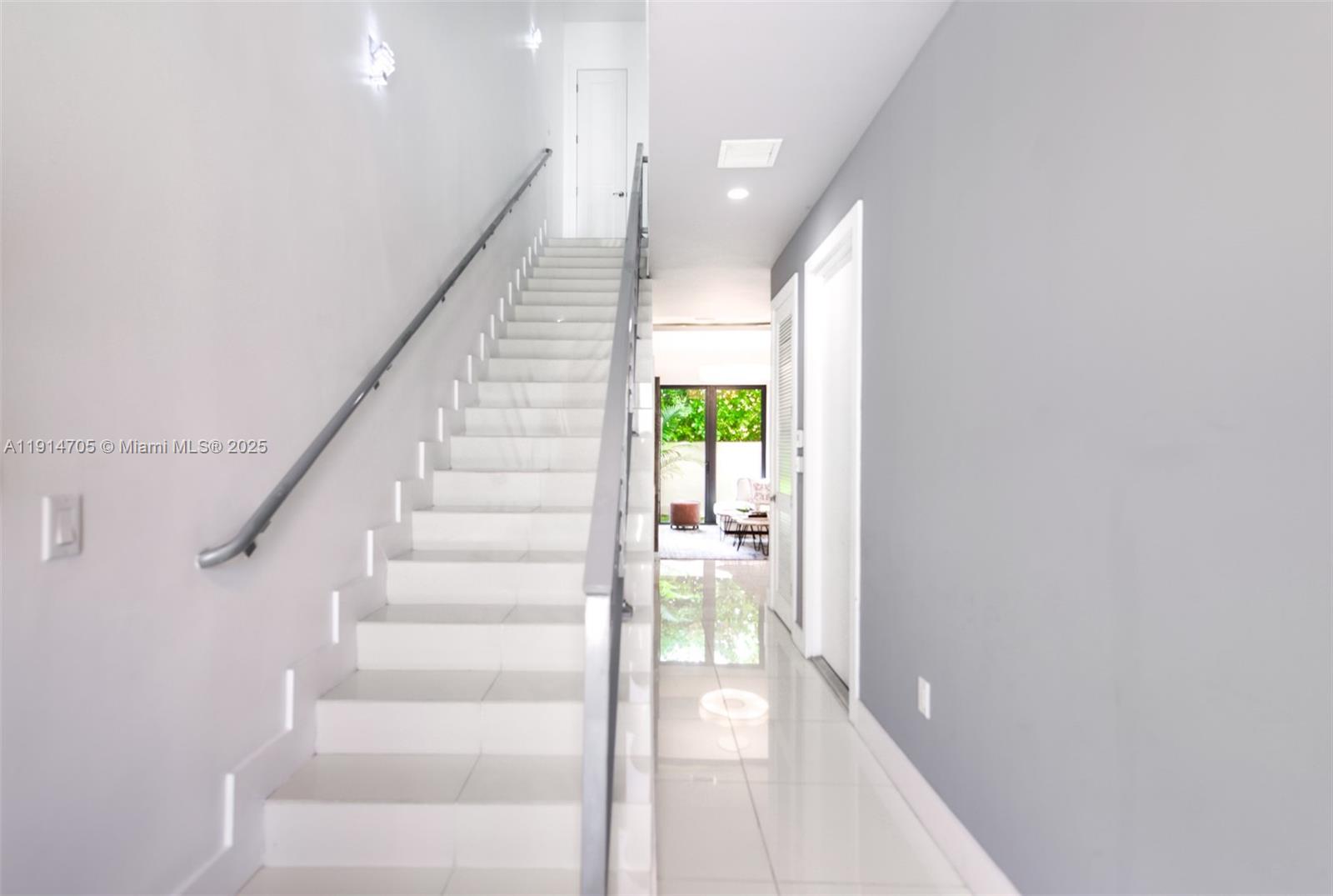 3318 Day Avenue, Unit 7 Miami, FL 33133 - Photo 5 of 39 a view of entryway and hall with wooden floor